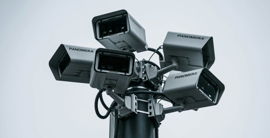 black and gray camera stand