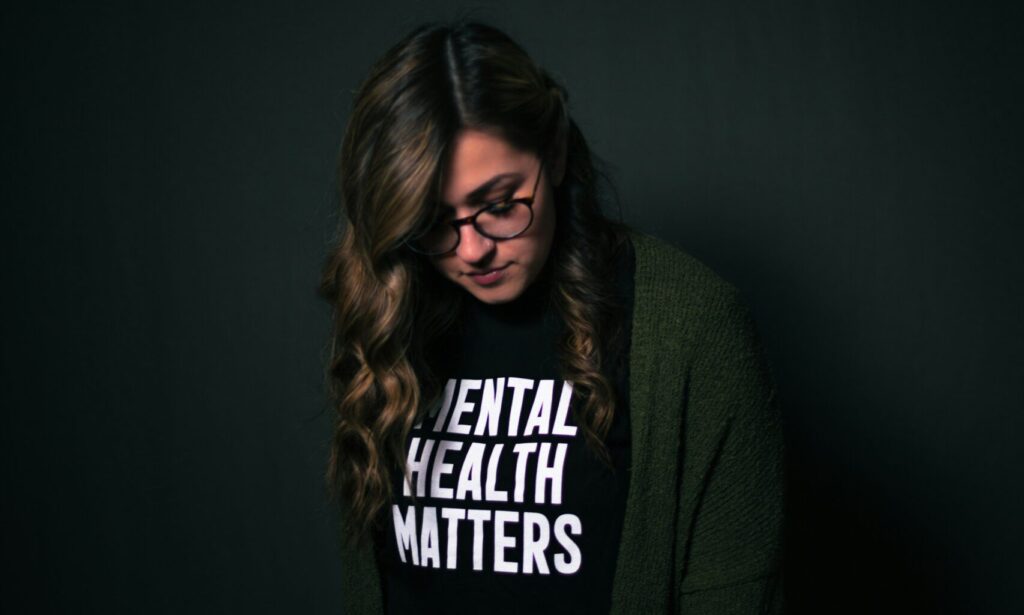 woman in black and white long sleeve shirt